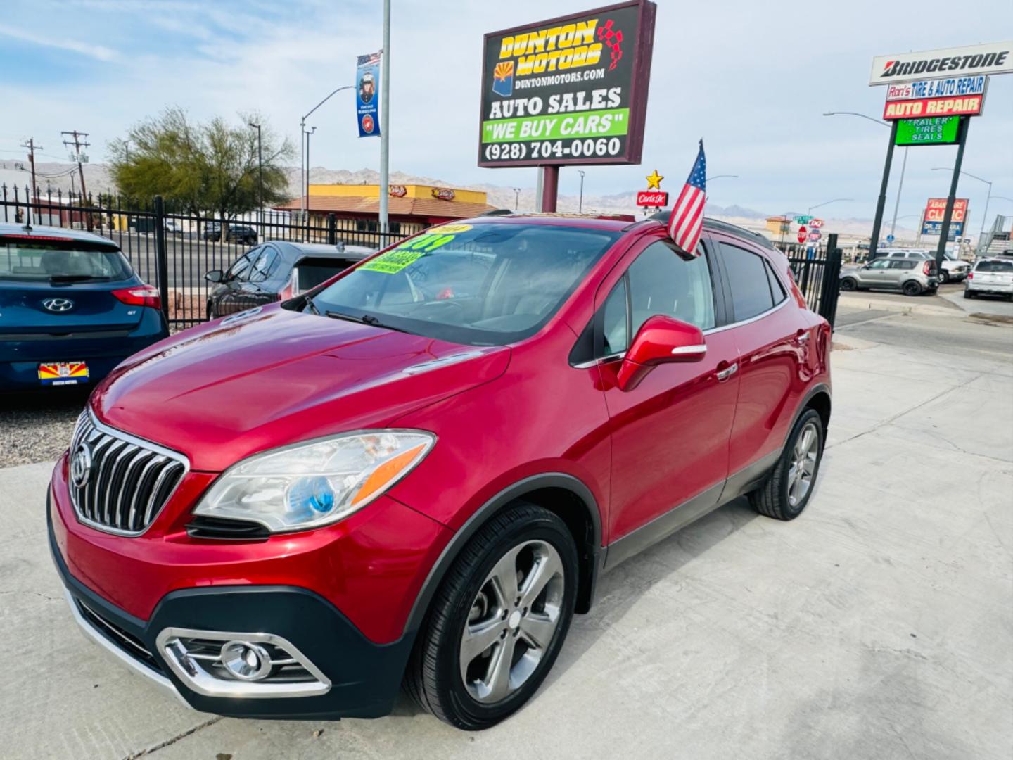 2014 Red Buick Encore (KL4CJCSB2EB) , located at 2190 Hwy 95, Bullhead City, AZ, 86442, (928) 704-0060, 0.000000, 0.000000 - 2014 Buick encore . Leather loaded . Moonroof , Bluetooth . Backup camera . - Photo#0